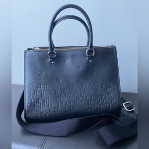 Elegant black leather handbag, shoulder or crossbody bag